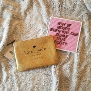 Kate spade holiday drive pouch.
